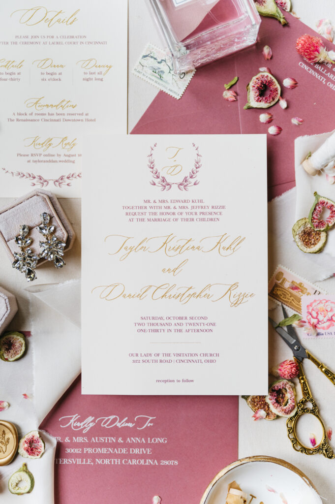 Semi custom wedding invitations printed in gold and mauve with matching mauve envelopes.