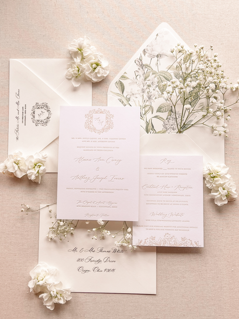 WHITE AND GOLD WEDDING INVITATION SUITE WITH WHITE FLOWER ACCESSORIES
